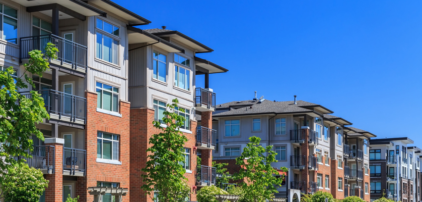 Modern mid-rise apartment buildings - https://www.sartori-insurance.com/